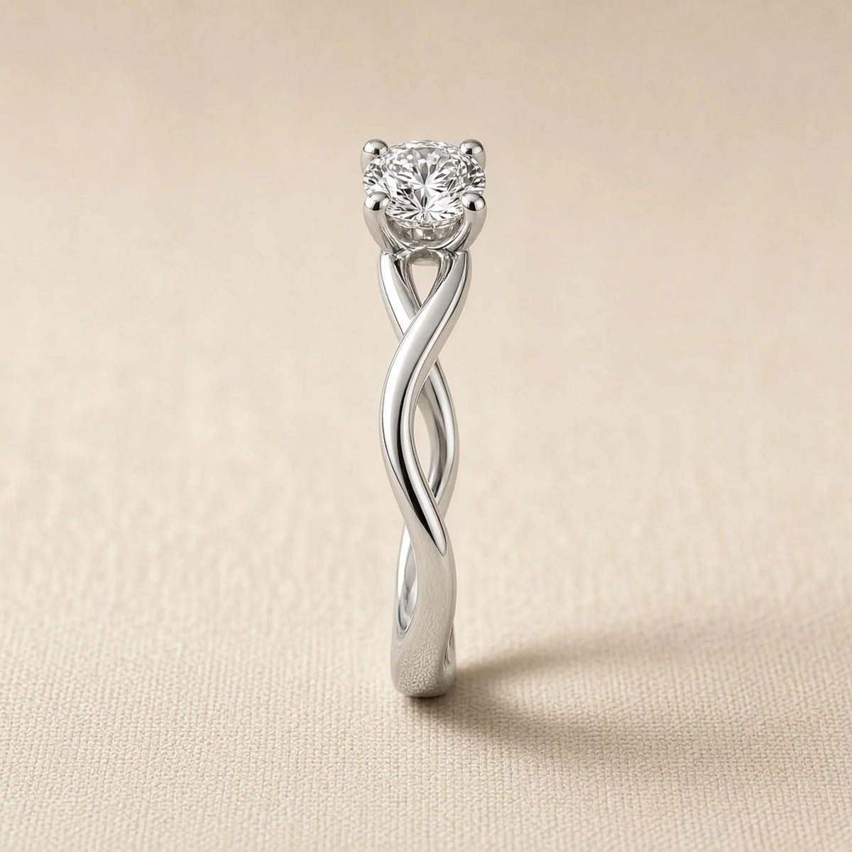 Sculptural engagement ring in 18K white gold, side profile of the twisting band