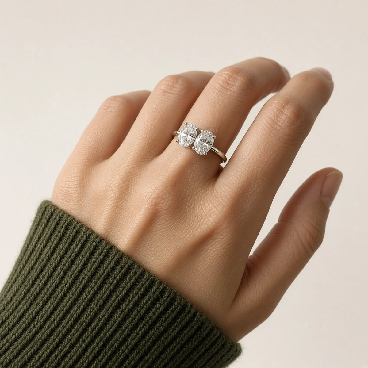 Two-stone oval lab-grown diamond toi et moi ring on the left ring finger