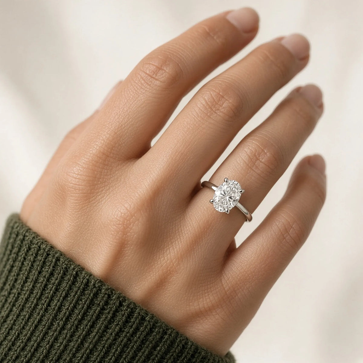2.05 ct oval lab-grown diamond, E colour, VVS2 clarity, Excellent polish, on hand in an 18K white gold solitaire