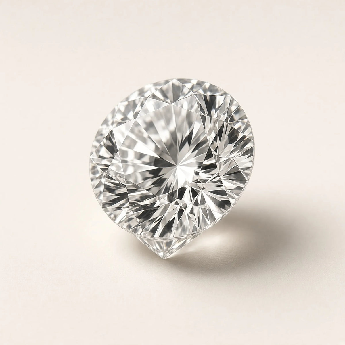 3.06 ct round lab-grown diamond, D colour, VVS2 clarity, Ideal cut, tilted view showing crown and pavilion