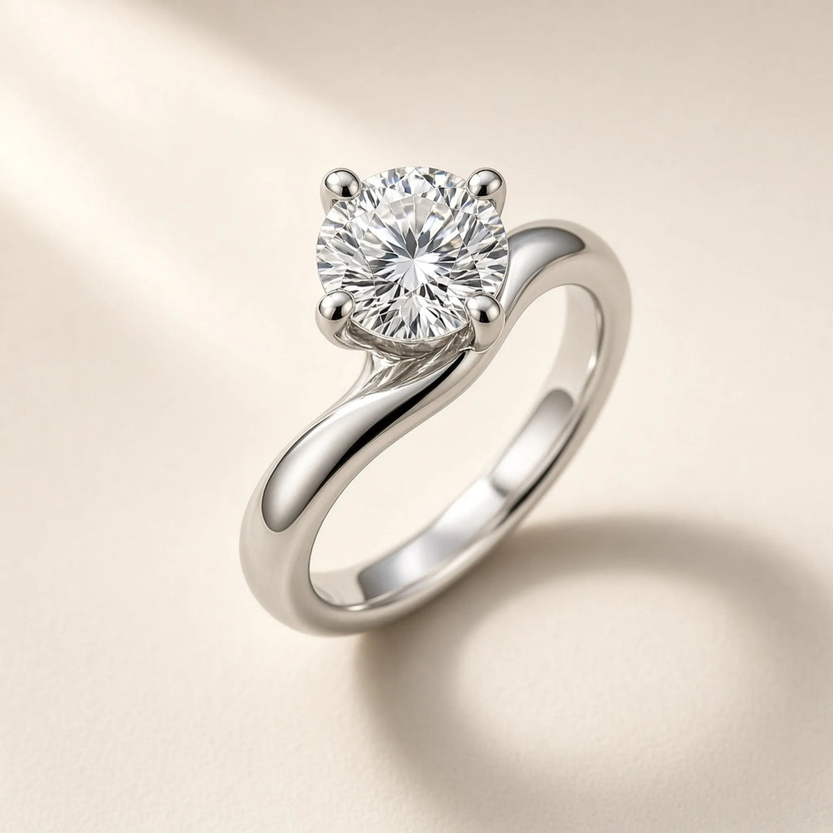 Sculptural engagement ring in 18K white gold with a four-prong round lab-grown diamond, three-quarter view